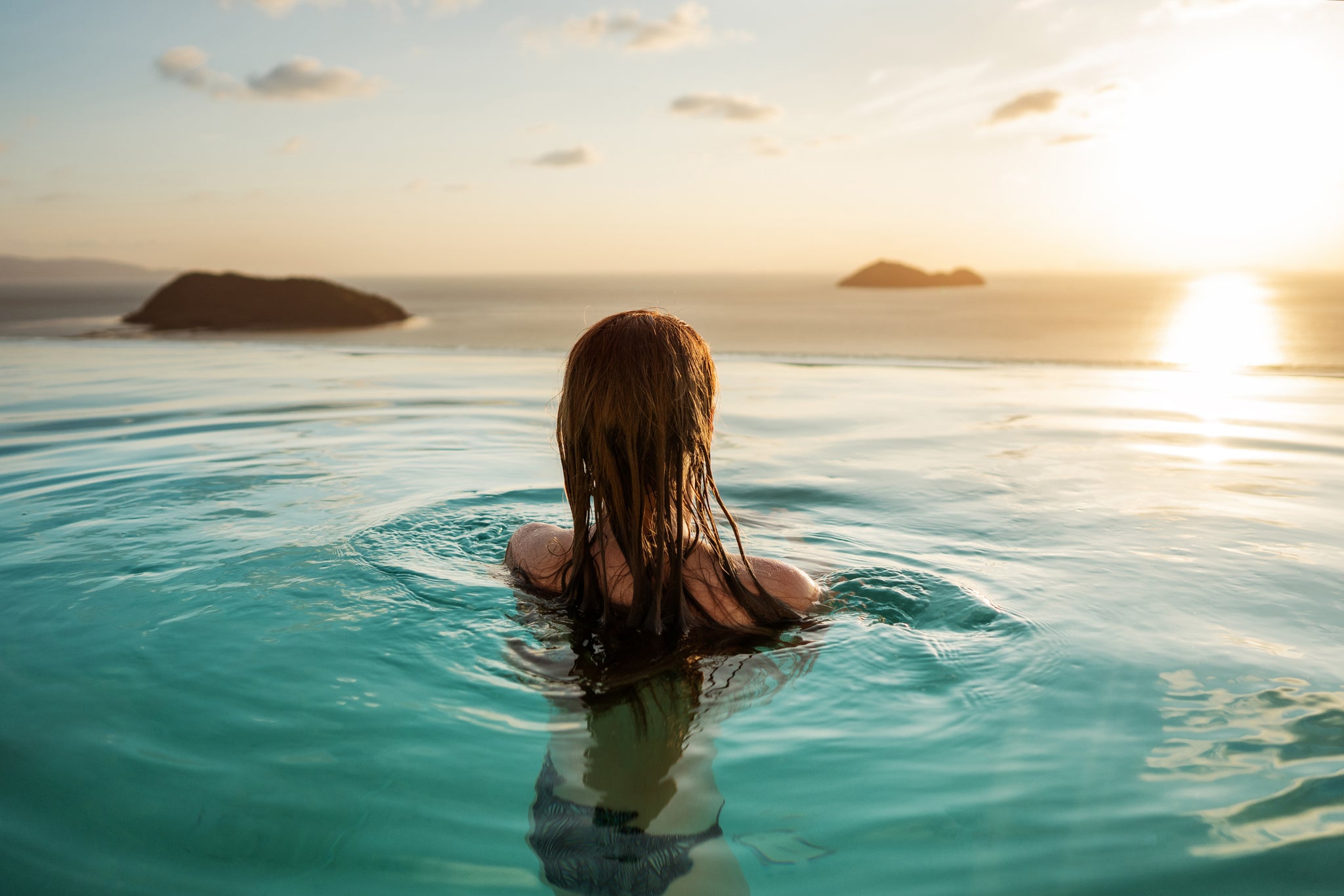 How to Protect Your Hair From Chlorine Water Damage